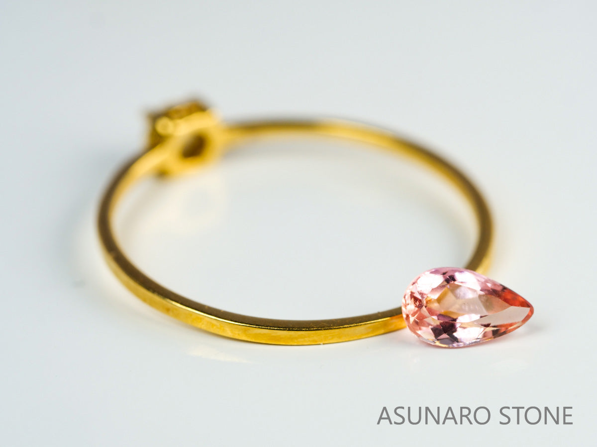 インペリアルトパーズ　ペアシェイプ　0.38ct　ブラジル産　【231010-1845】