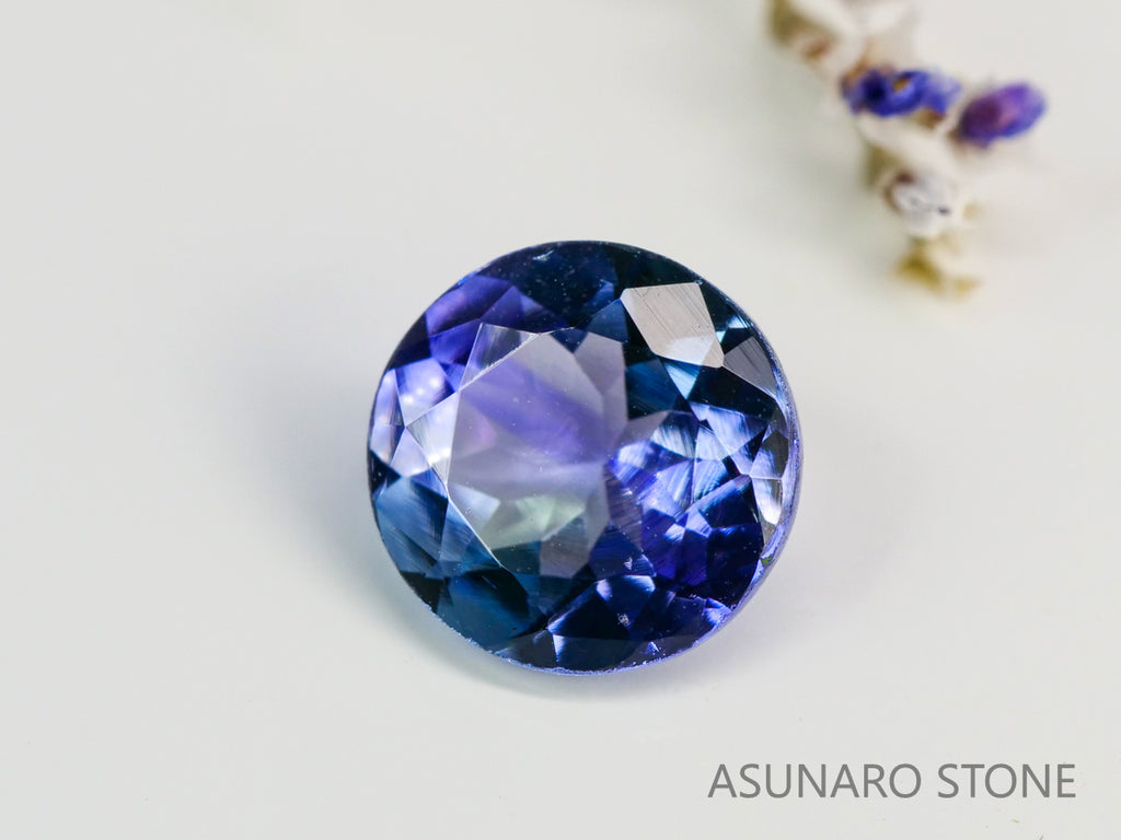 パーティーカラータンザナイト　ラウンドカット　タンザニア産　　0.83ct【240115-1990】