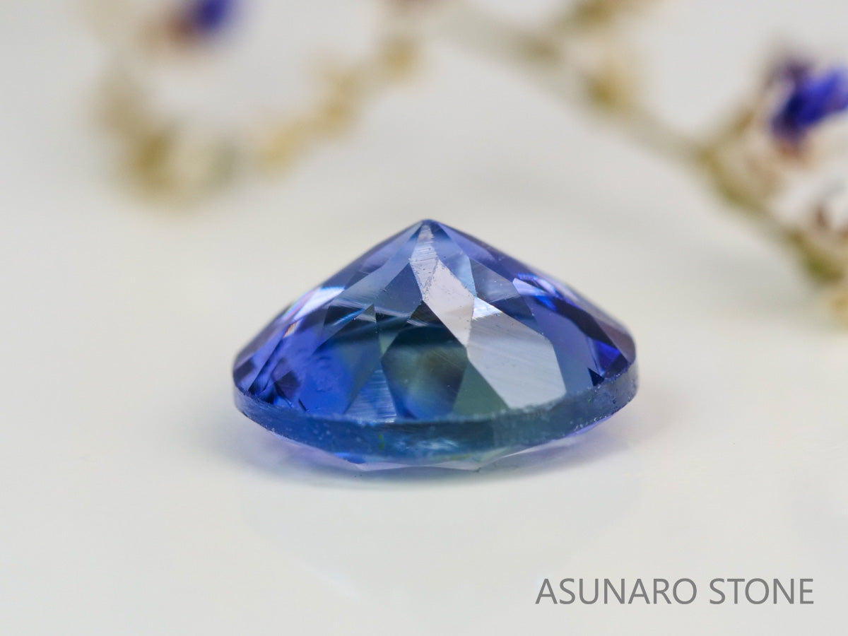 パーティーカラータンザナイト　ラウンドカット　タンザニア産　　0.83ct【240115-1990】