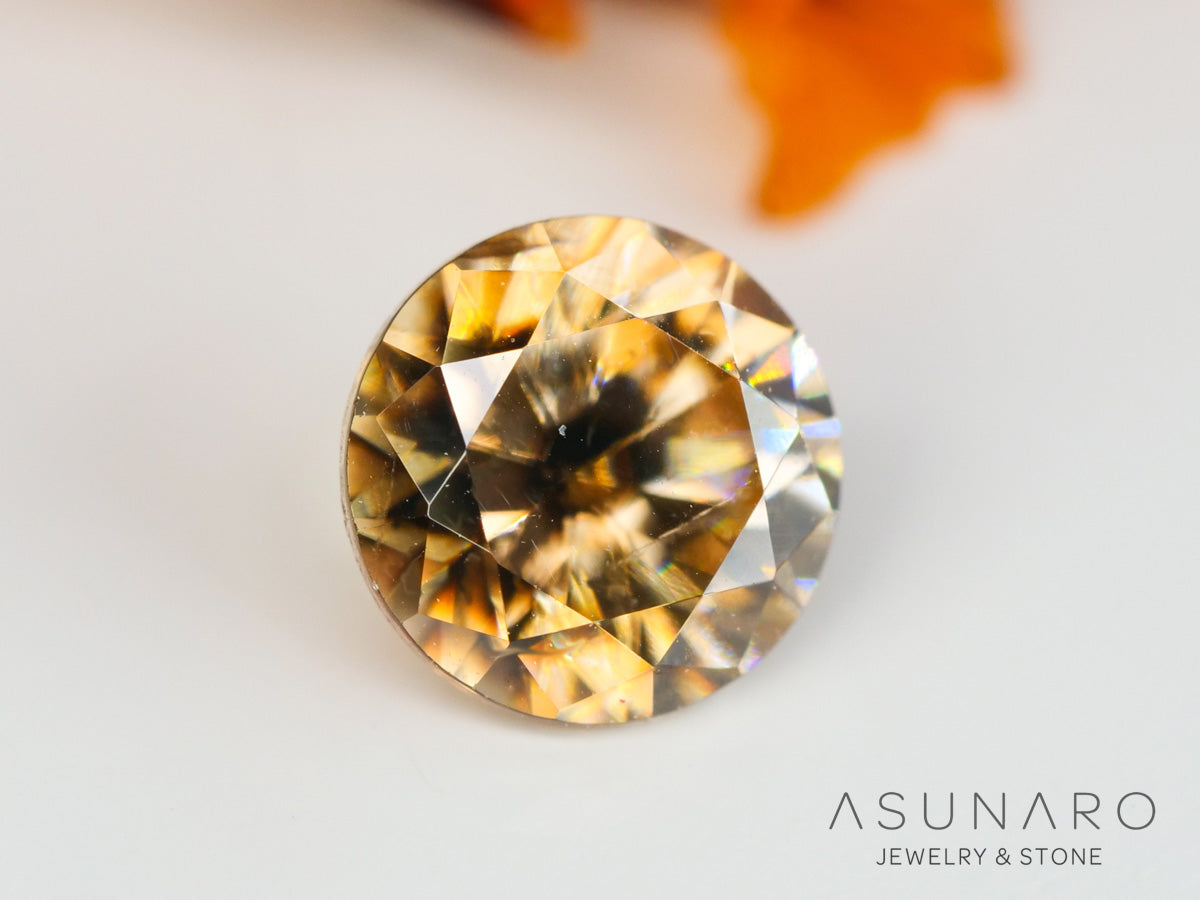 バイカラーキャシテライト  ラウンドカット　ビルマ産 　0.86ct　【240404-2138】