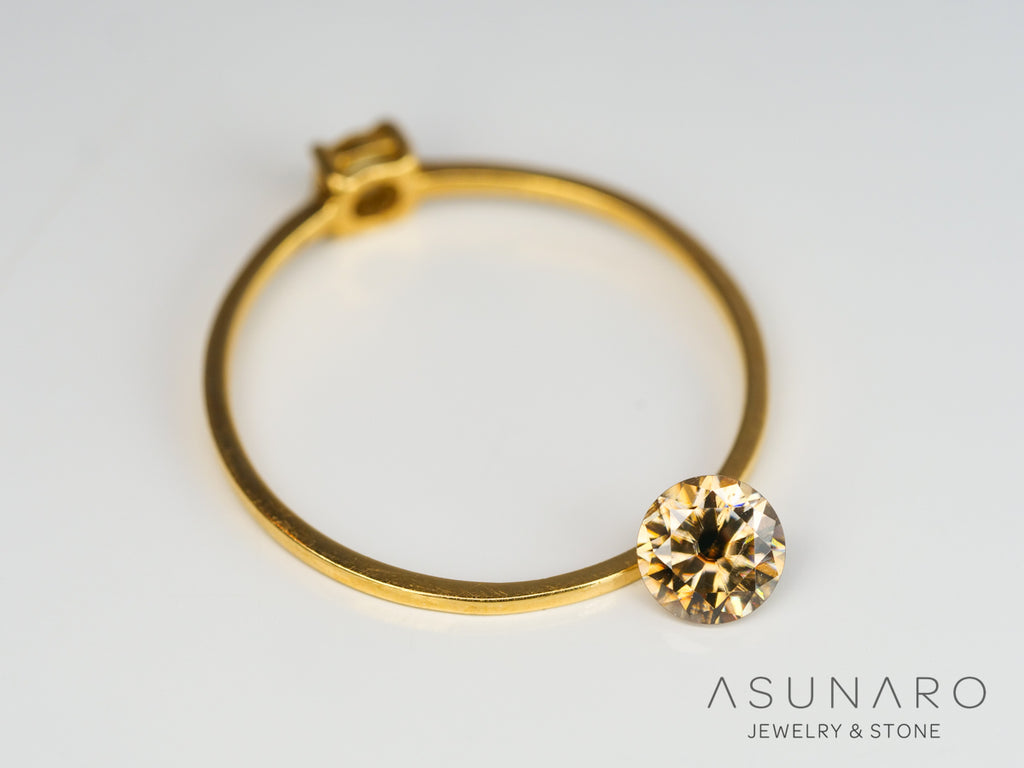 バイカラーキャシテライト  ラウンドカット　ビルマ産 　0.86ct　【240404-2138】