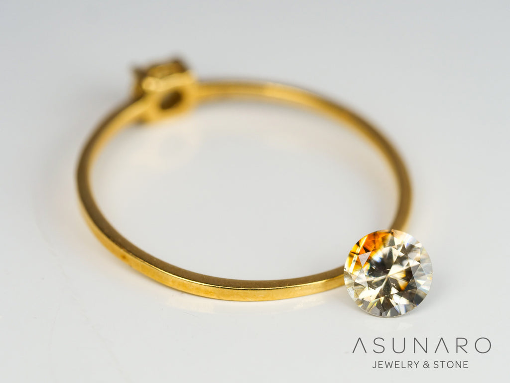 バイカラーキャシテライト  ラウンドカット　ビルマ産 　0.76ct　【240404-2143】