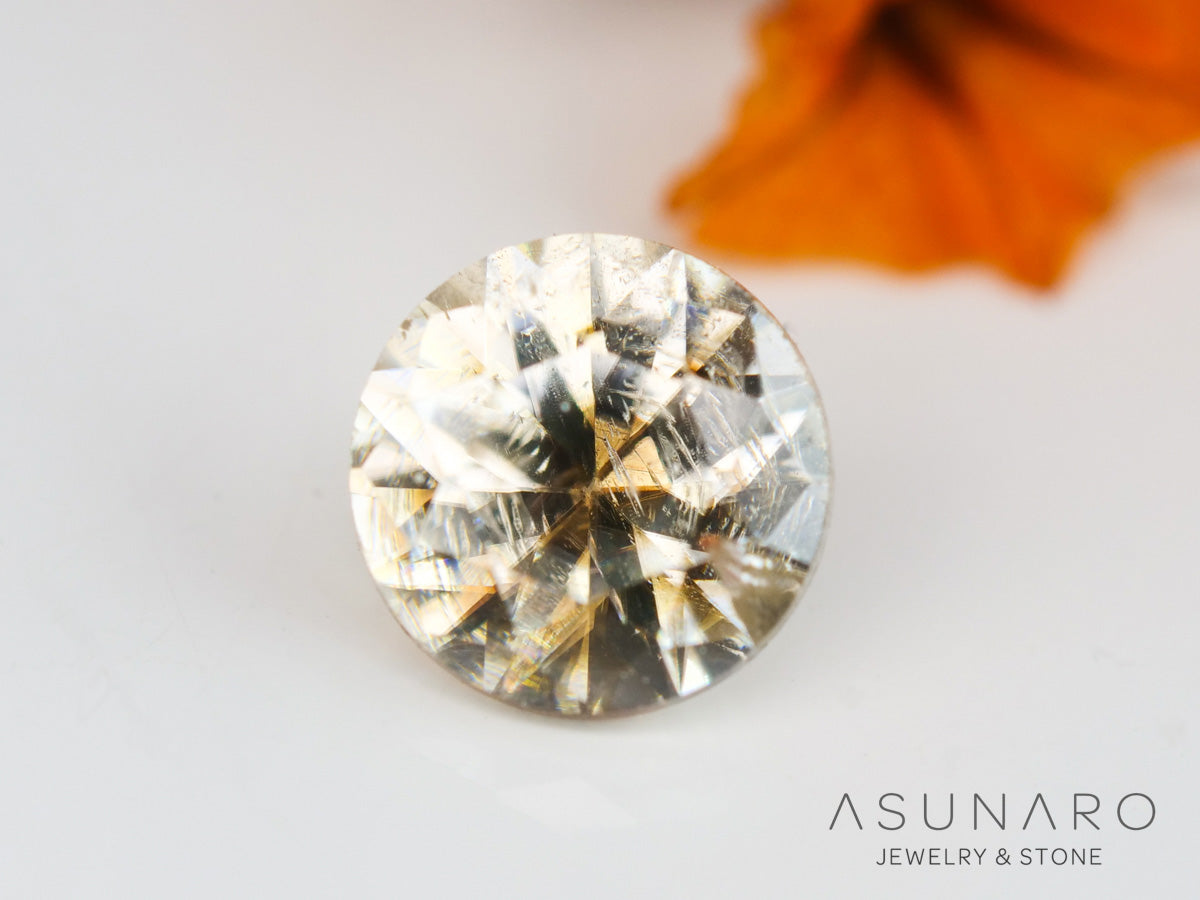 バイカラーキャシテライト  ラウンドカット　ビルマ産 　0.57ct　【240404-2146】