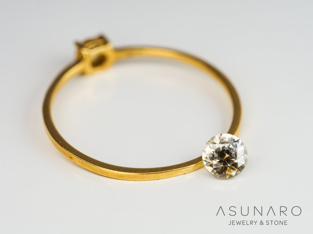 バイカラーキャシテライト  ラウンドカット　ビルマ産 　0.57ct　【240404-2146】