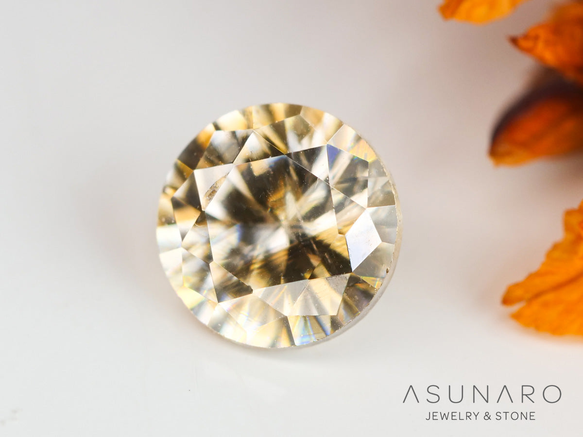 バイカラーキャシテライト ラウンドカット ビルマ産 0.59ct 【240404