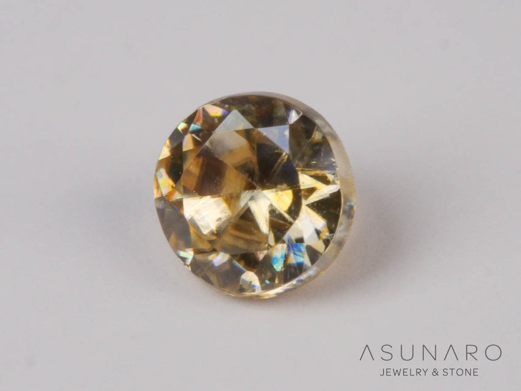 バイカラーキャシテライト  ラウンドカット　ビルマ産 　0.40ct　【250508-2941】