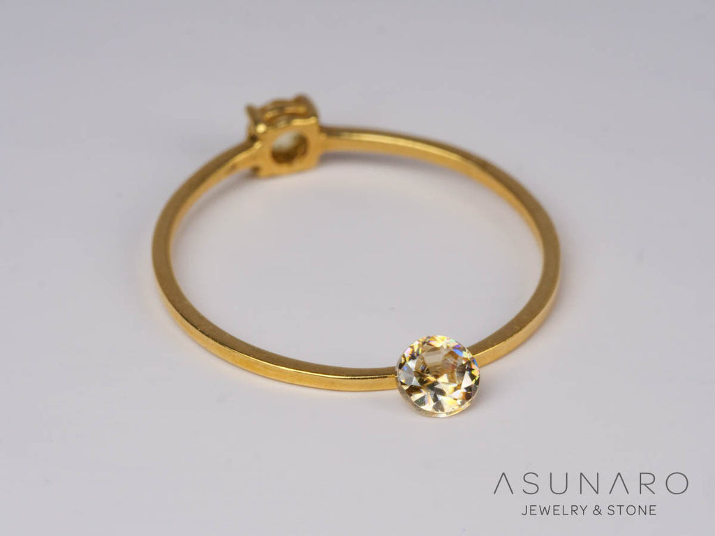 バイカラーキャシテライト  ラウンドカット　ビルマ産 　0.40ct　【250508-2941】