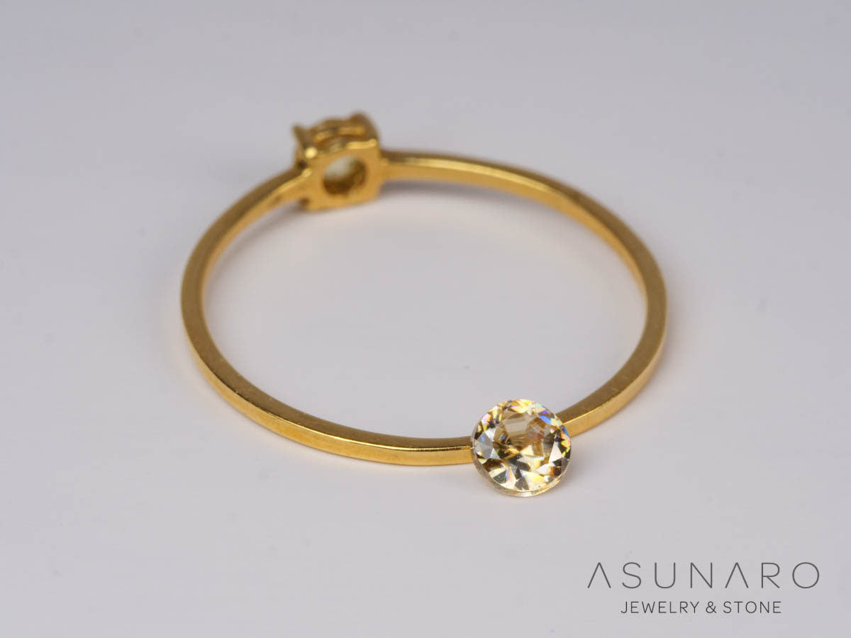 バイカラーキャシテライト  ラウンドカット　ビルマ産 　0.40ct　【250508-2941】