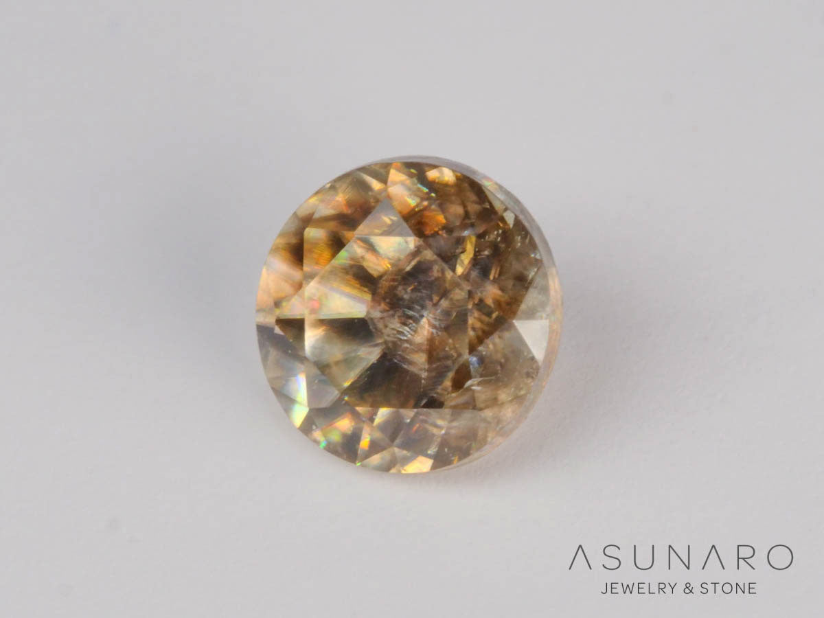 バイカラーキャシテライト  ラウンドカット　ビルマ産 　0.90ct　【250508-2942】