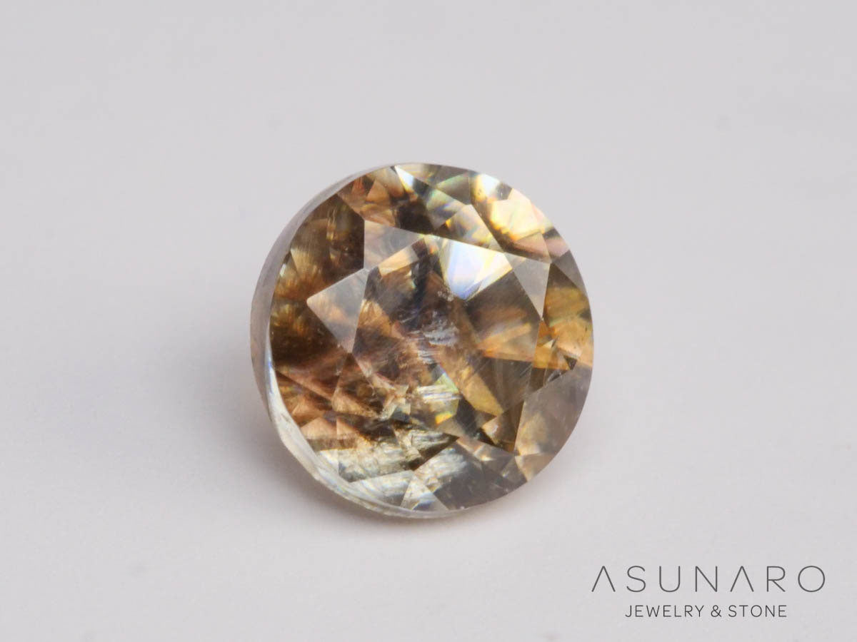 バイカラーキャシテライト  ラウンドカット　ビルマ産 　0.90ct　【250508-2942】