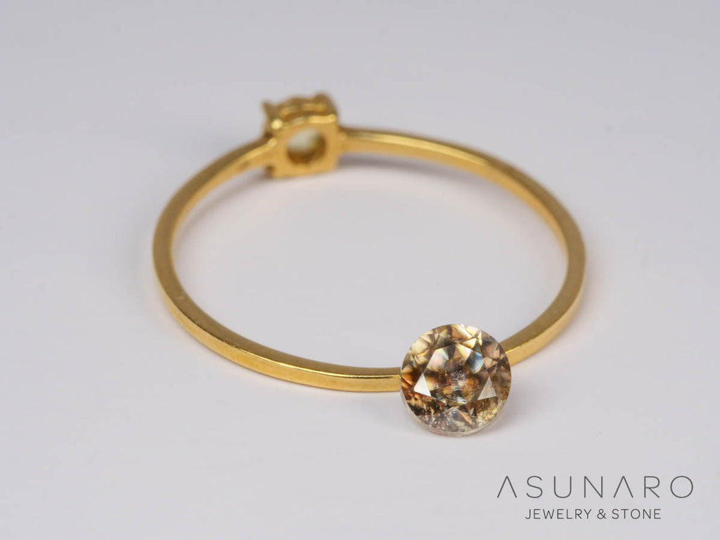 バイカラーキャシテライト  ラウンドカット　ビルマ産 　0.90ct　【250508-2942】