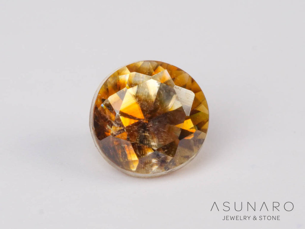 バイカラーキャシテライト  ラウンドカット　ビルマ産 　0.66ct　【250508-2946】