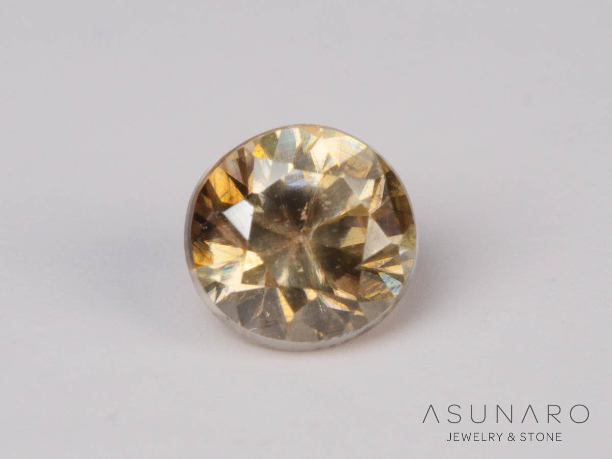 バイカラーキャシテライト  ラウンドカット　ビルマ産 　0.58ct　【250508-2948】