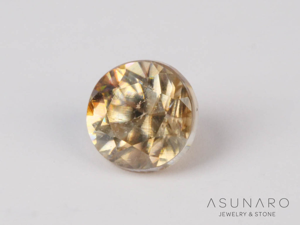 バイカラーキャシテライト  ラウンドカット　ビルマ産 　0.58ct　【250508-2948】