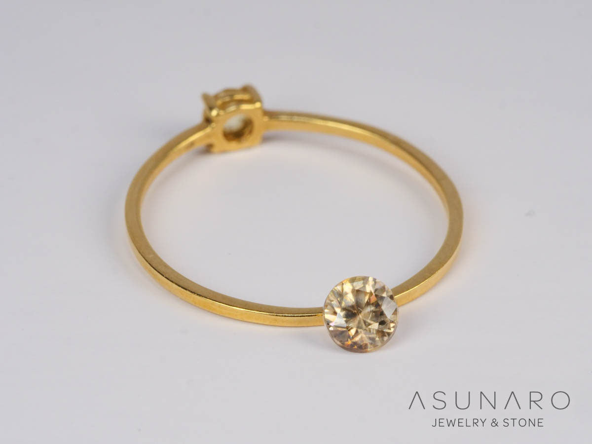 バイカラーキャシテライト  ラウンドカット　ビルマ産 　0.58ct　【250508-2948】