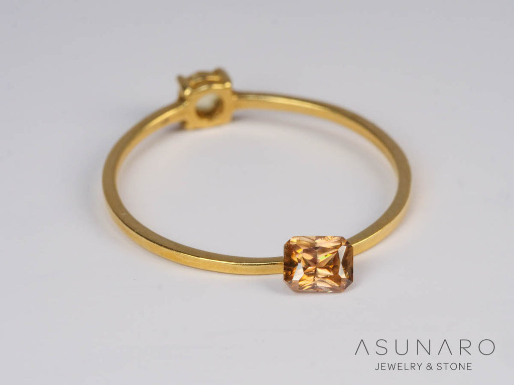 バイカラーキャシテライト  エメラルドカット　ビルマ産 　0.52ct　【250508-2949】