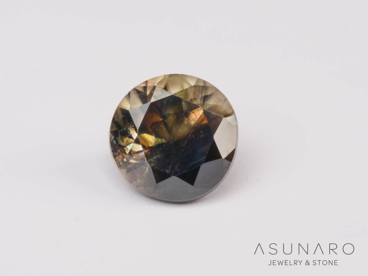 バイカラーキャシテライト  ラウンドカット　ビルマ産 　0.88ct　【250508-2950】