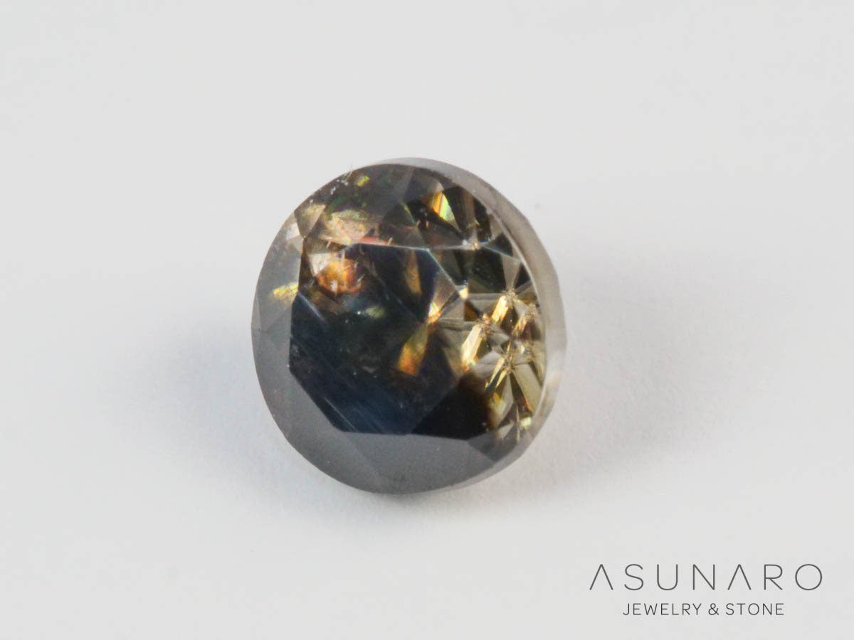 バイカラーキャシテライト  ラウンドカット　ビルマ産 　0.88ct　【250508-2950】