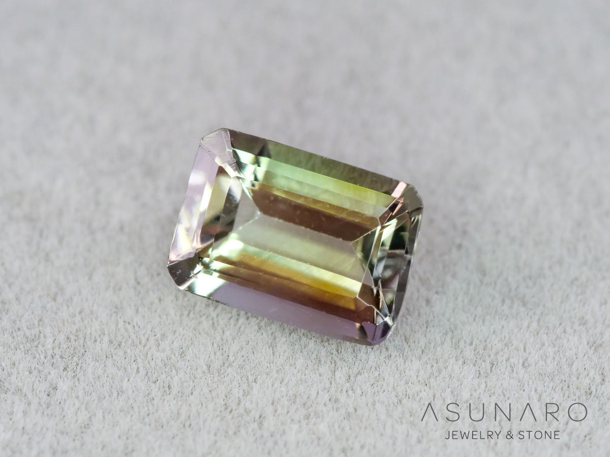 バイカラーゾイサイト（タンザナイト）エメラルドカット　タンザニア産　0.91ct【261002-3399】