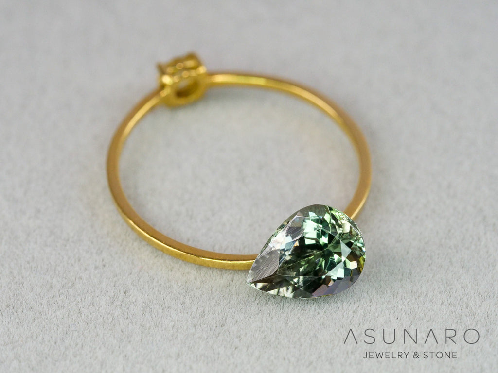 バイカラーゾイサイト（タンザナイト）ペアシェイプ　タンザニア産　1.22ct【261002-3403】