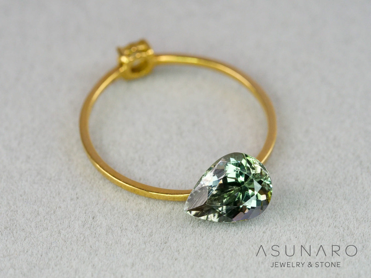 バイカラーゾイサイト（タンザナイト）ペアシェイプ　タンザニア産　1.22ct【261002-3403】