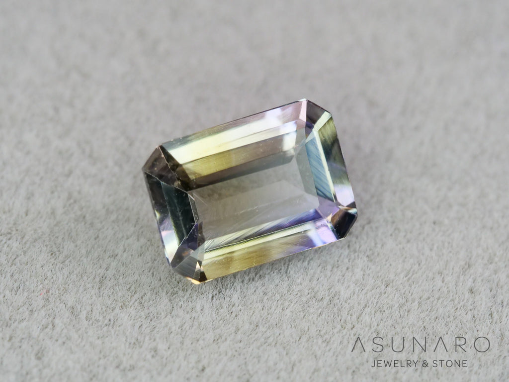 パーティーカラーゾイサイト（タンザナイト）エメラルドカット　タンザニア産　0.90ct【261002-3404】