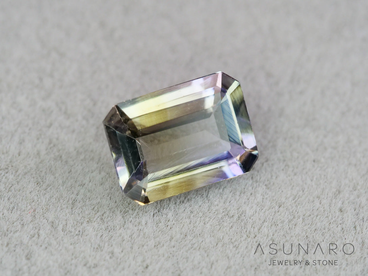 パーティーカラーゾイサイト（タンザナイト）エメラルドカット　タンザニア産　0.90ct【261002-3404】