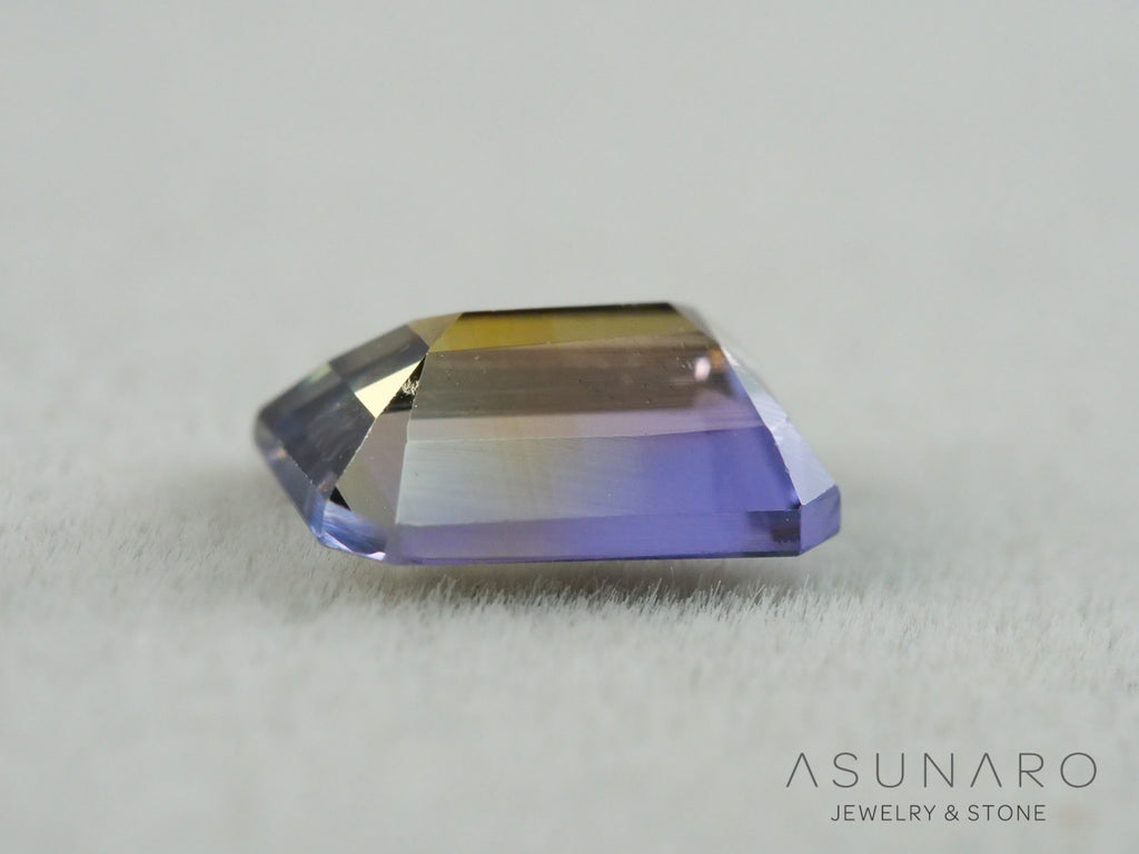 パーティーカラーゾイサイト（タンザナイト）エメラルドカット　タンザニア産　0.90ct【261002-3404】