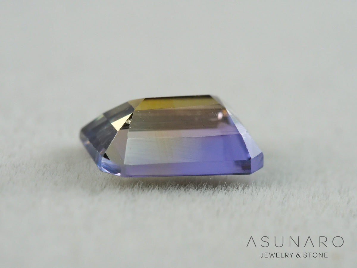 パーティーカラーゾイサイト（タンザナイト）エメラルドカット　タンザニア産　0.90ct【261002-3404】