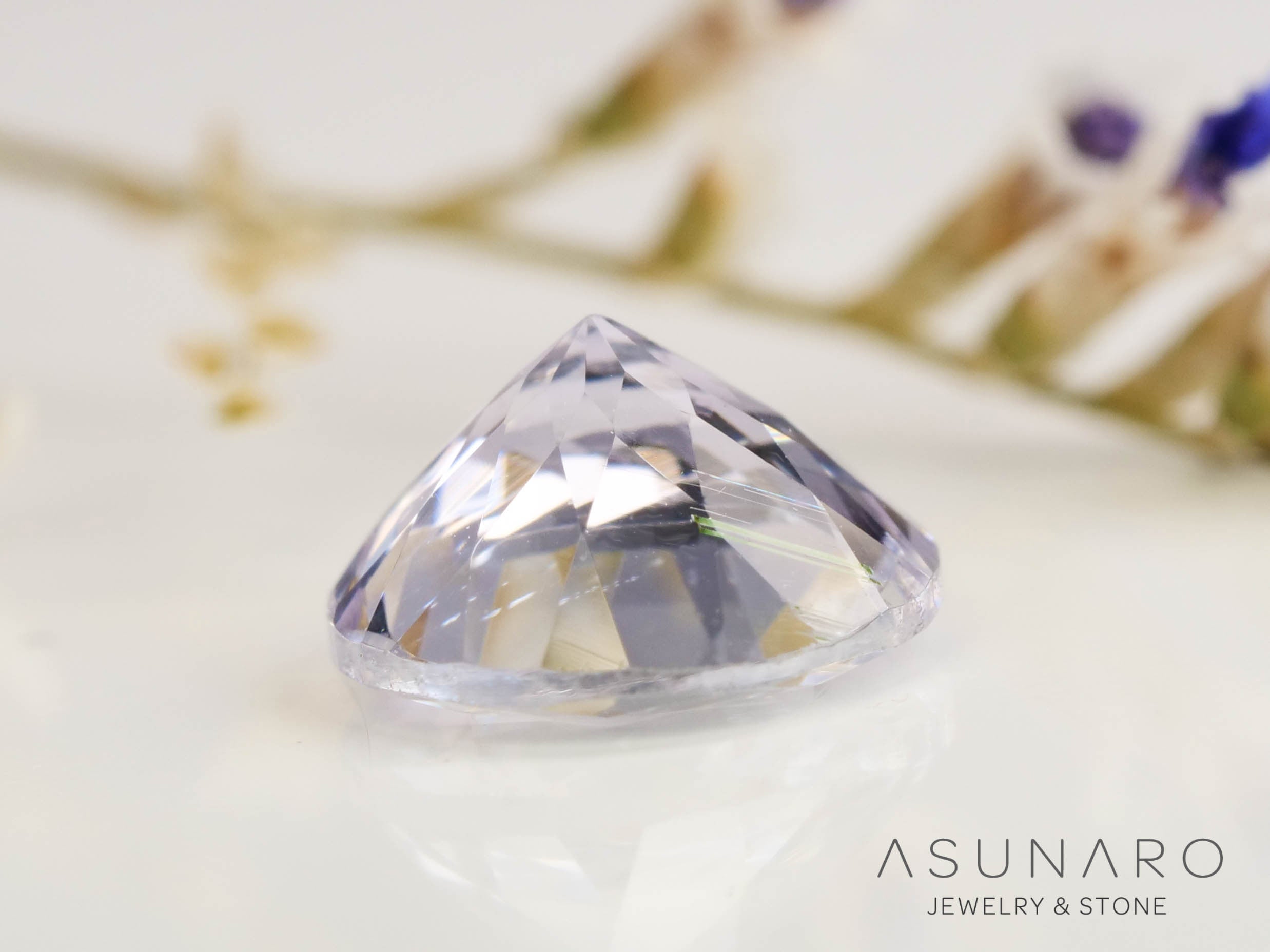 バイカラーゾイサイト（タンザナイト） ラウンドカット　タンザニア産　0.65ct【250130-1789】