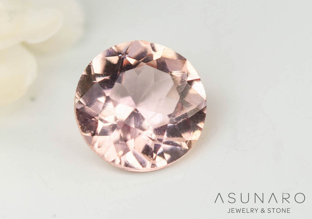 インペリアルトパーズ　ラウンドカット　0.17ct　ブラジル産　【2406016-2152】