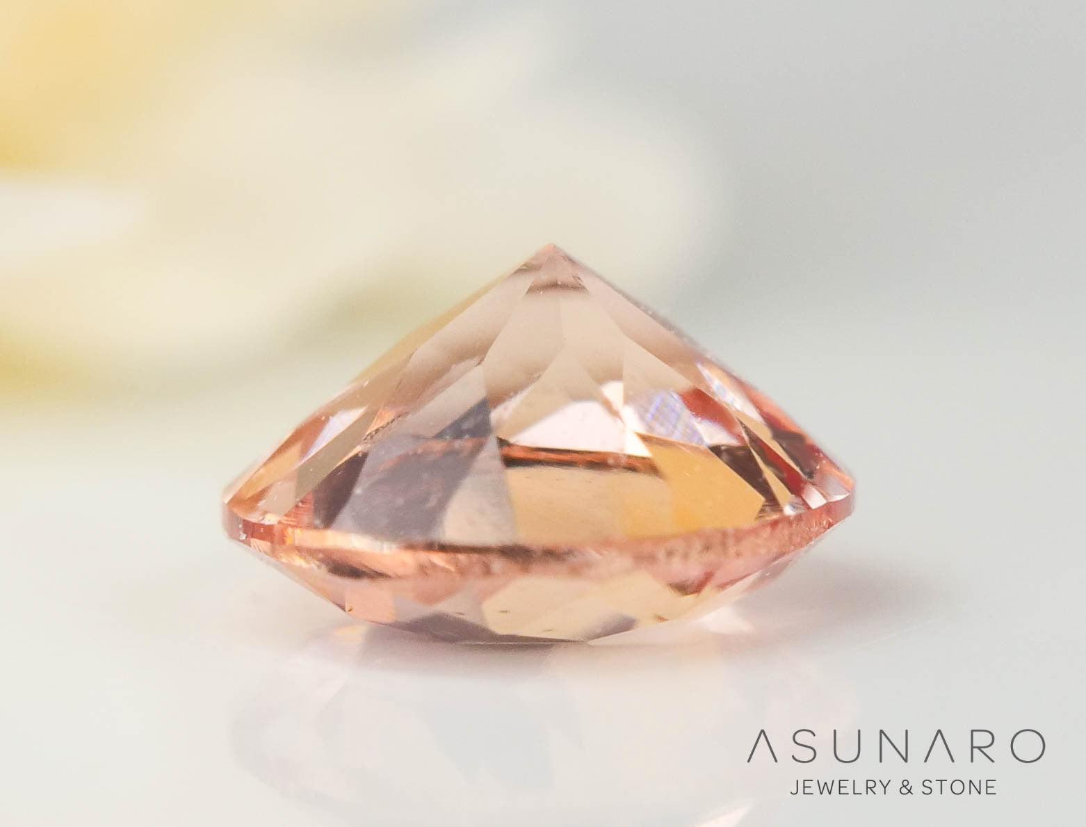 インペリアルトパーズ　ラウンドカット　0.17ct　ブラジル産　【2406016-2152】