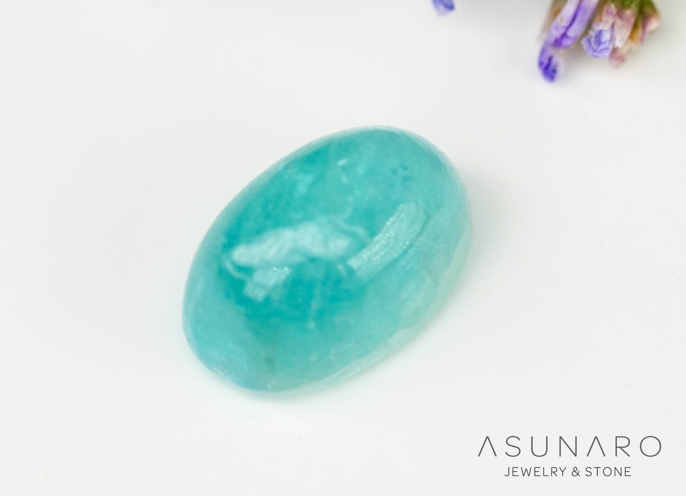 パライバトルマリン カボション ブラジル産 0.65ct 【240523-2221