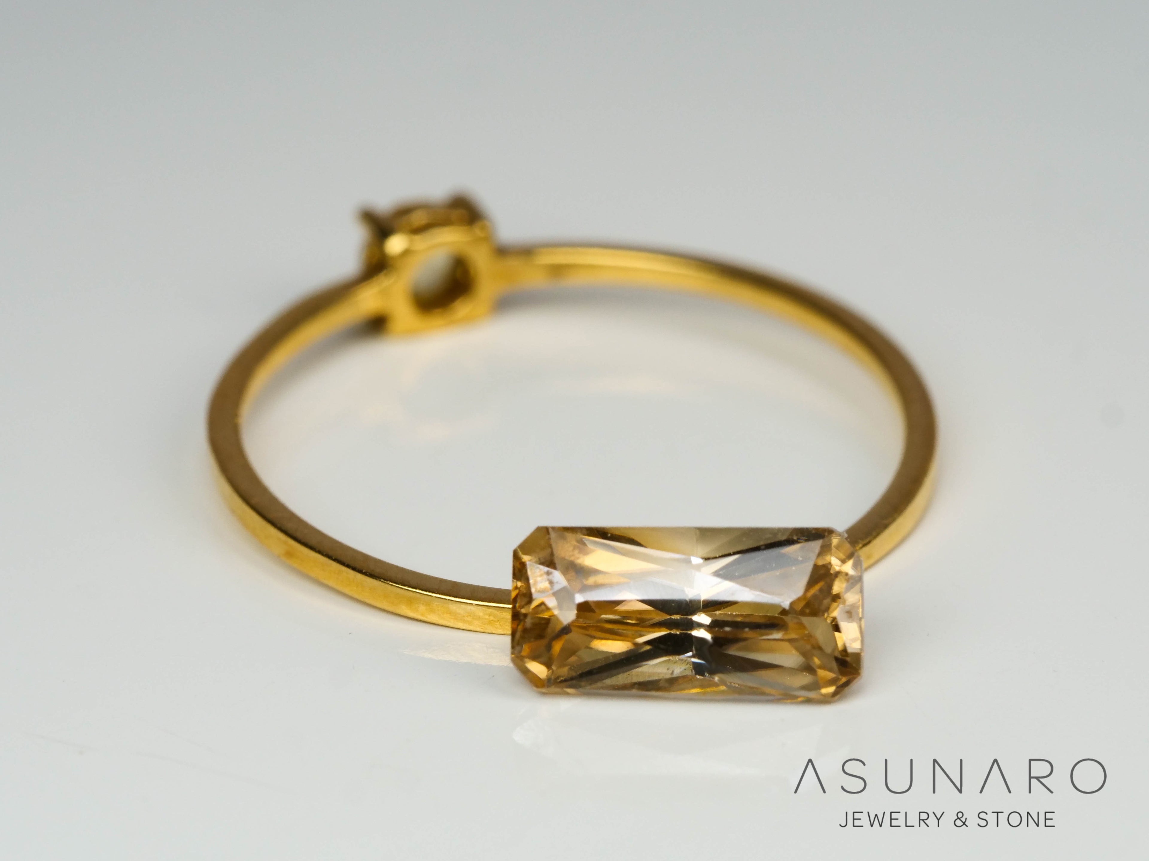 シャンパンバイカラージルコン　エメラルドカット　1.57ct　カンボジア産　【241009-2447】