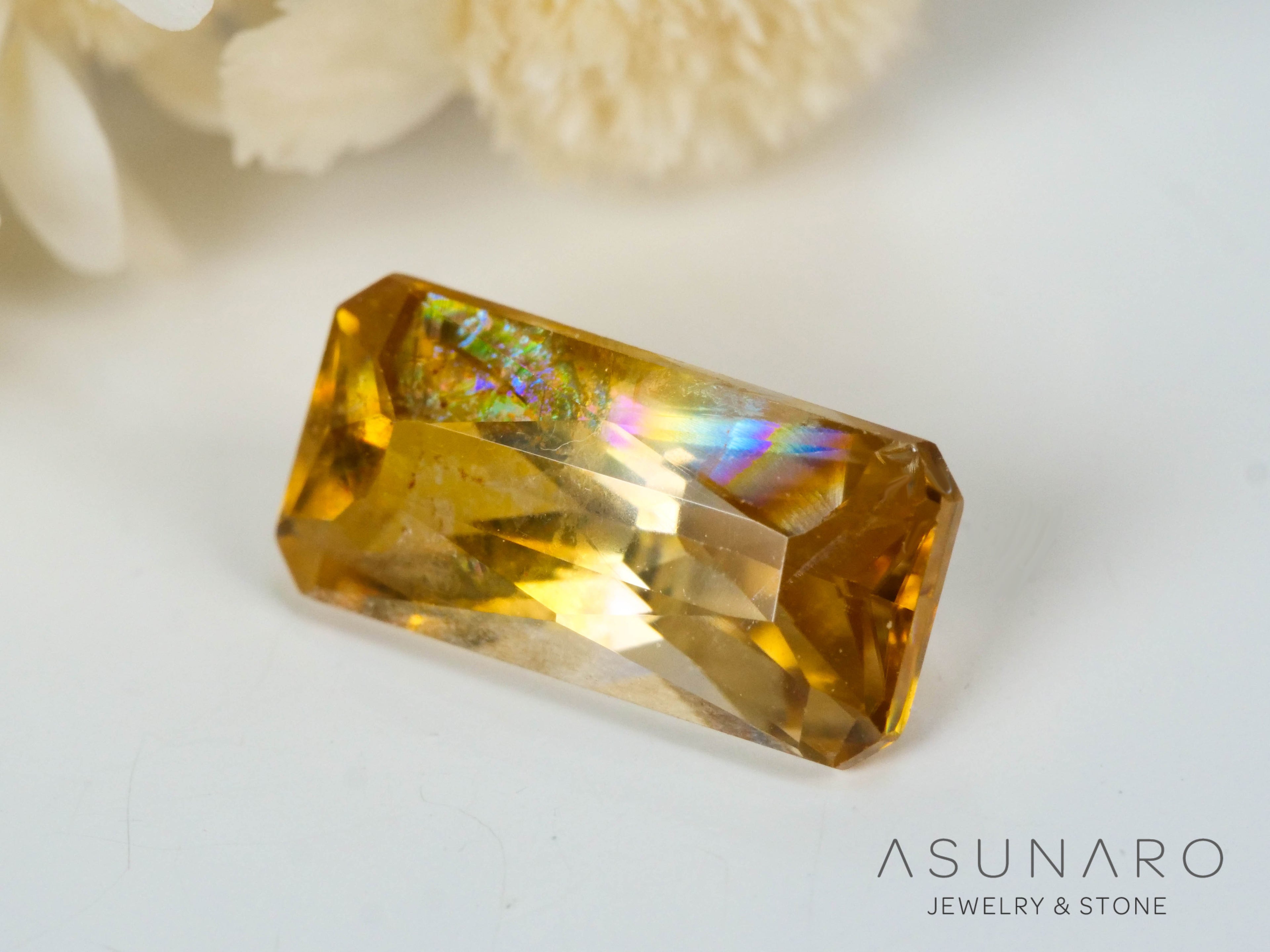 シャンパンバイカラージルコン　エメラルドカット　1.52ct　カンボジア産　【241009-2448】