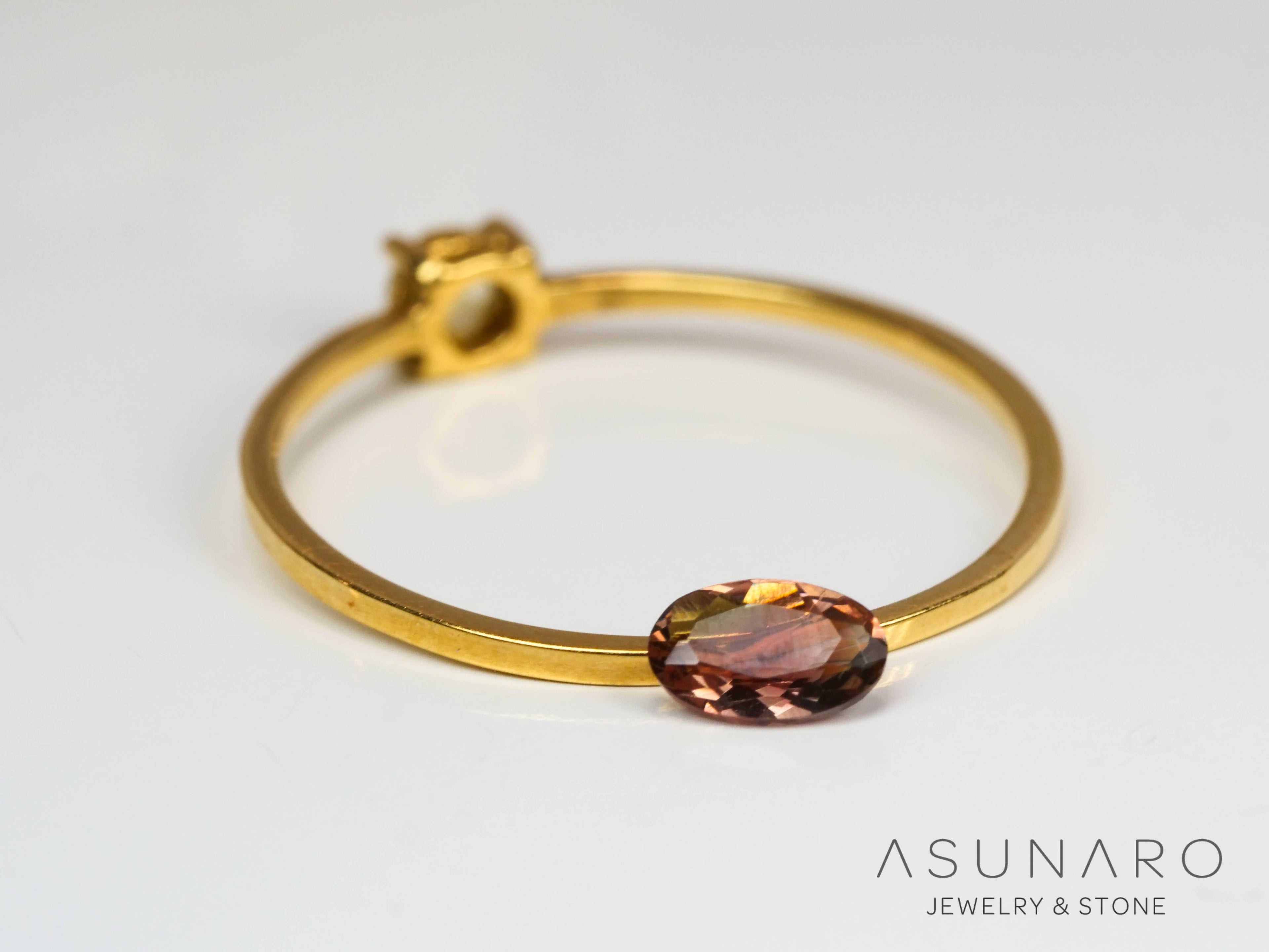 バイカラーアンデシン　オーバルカット　チベット産　0.20ct【240819-2472】