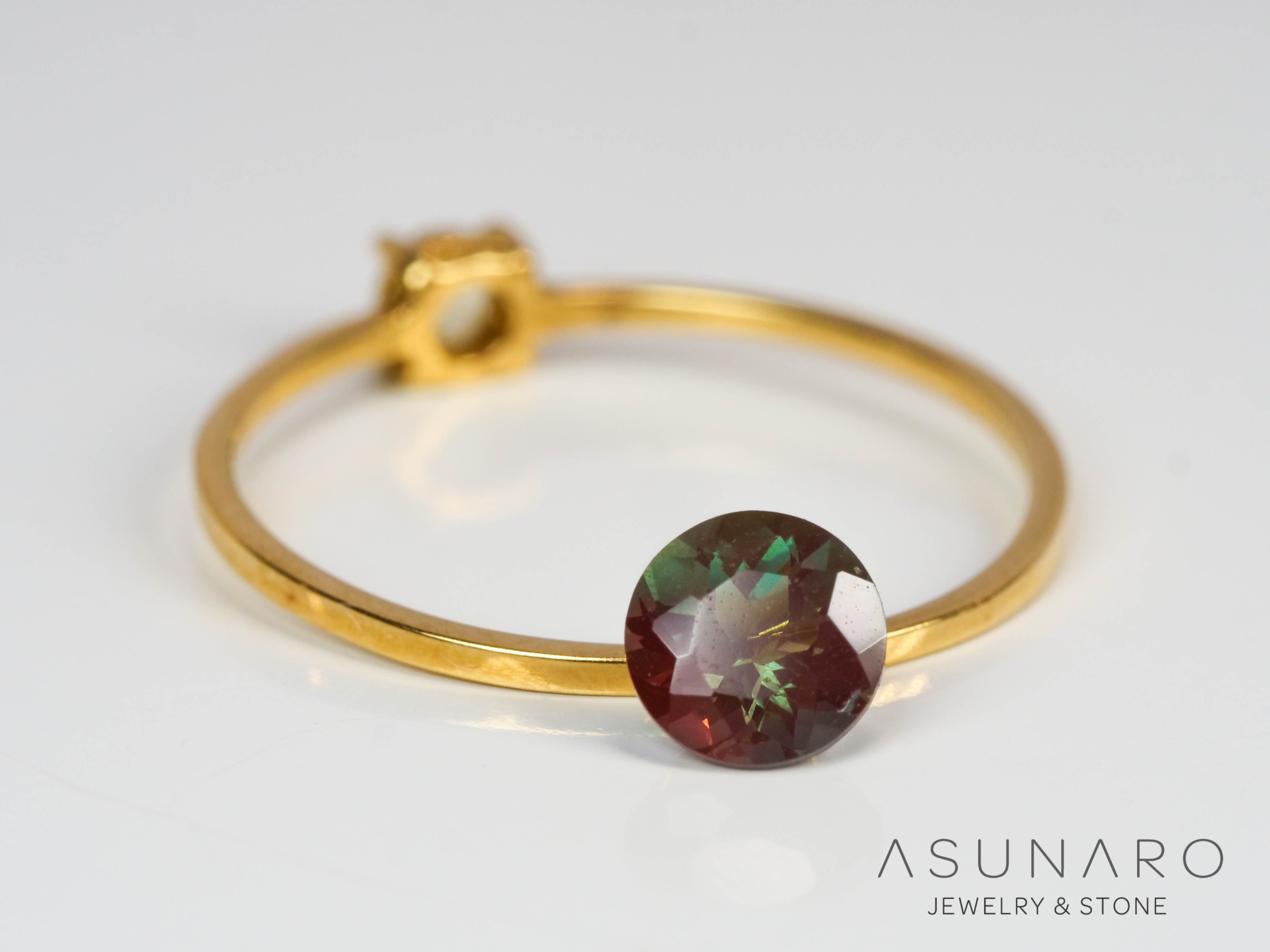 バイカラーアンデシン　ラウンドカット　チベット産　0.52ct【240903-2504】