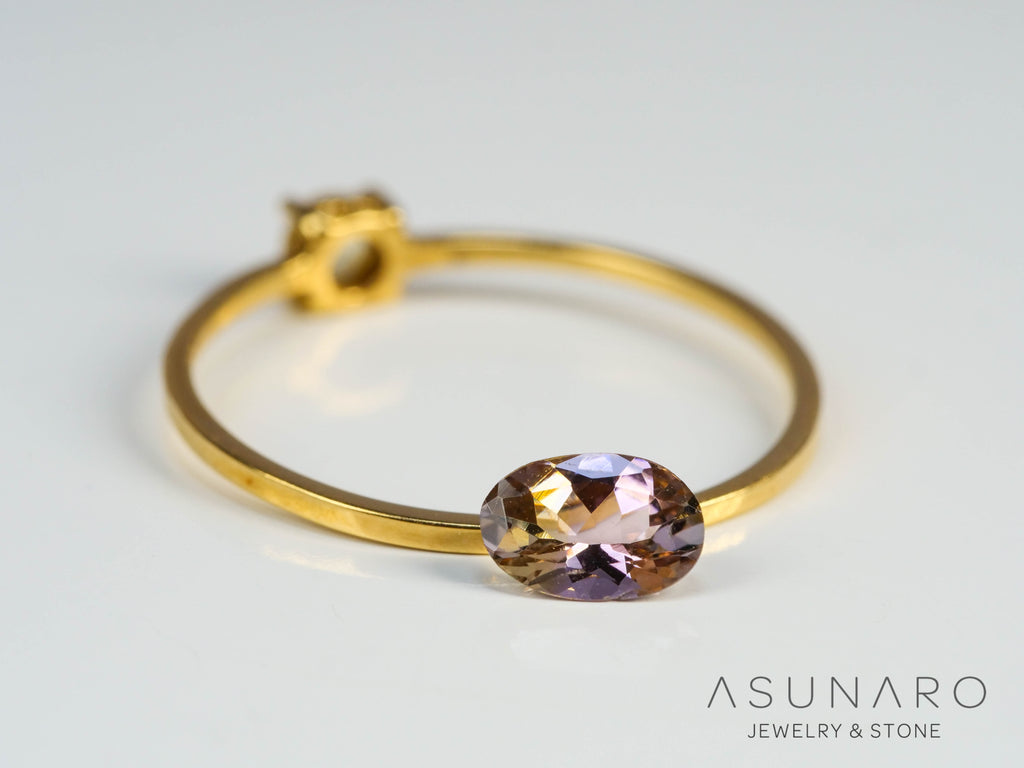 バイカラーゾイサイト（タンザナイト）  オーバルカット　タンザニア産　0.39ct【241122-2615】