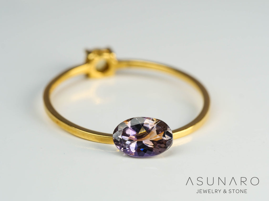 バイカラーゾイサイト（タンザナイト）  オーバルカット　タンザニア産　0.55ct【241122-2616】