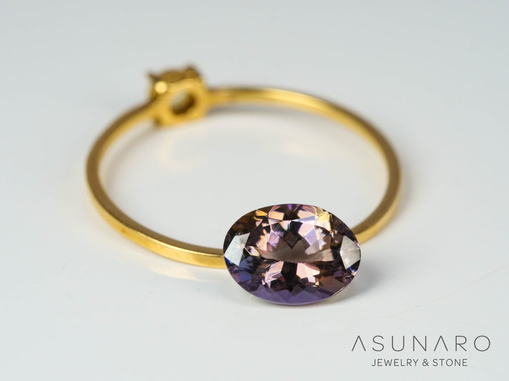 バイカラーゾイサイト（タンザナイト）  オーバルカット　タンザニア産　1.08ct【241122-2617】