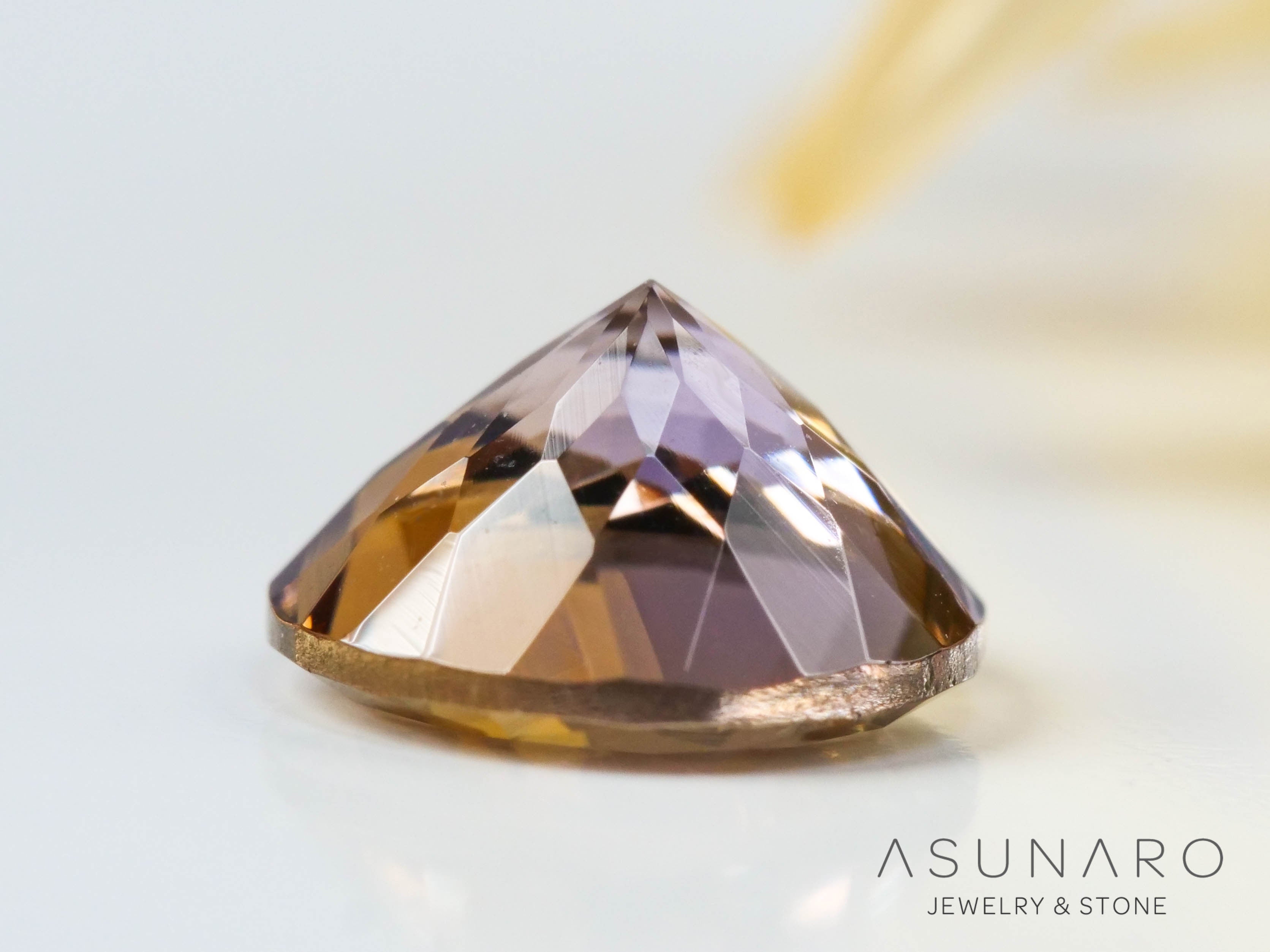 バイカラーゾイサイト（タンザナイト）  ラウンドカット　タンザニア産　1.10ct【241122-2619】