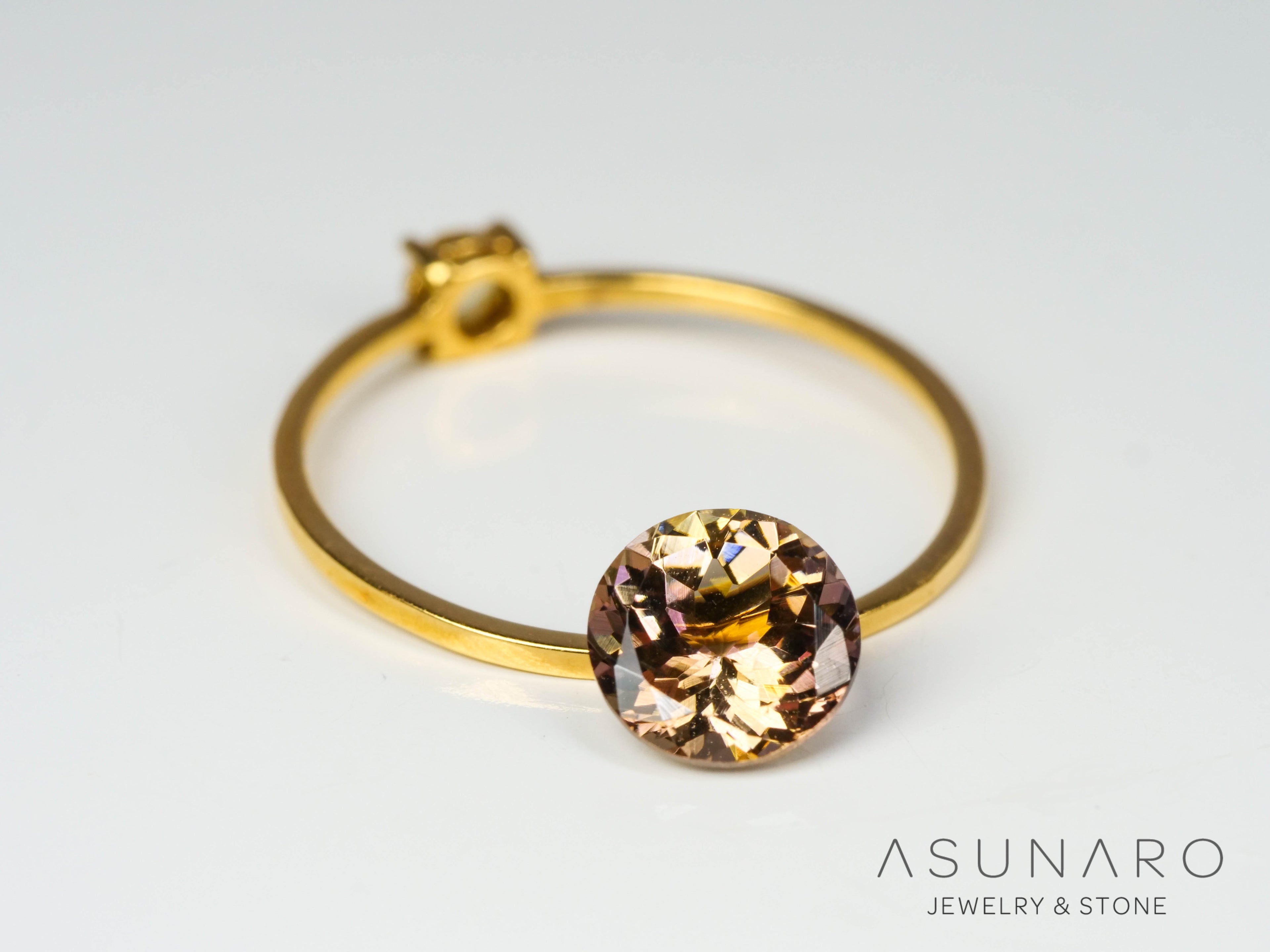 バイカラーゾイサイト（タンザナイト）  ラウンドカット　タンザニア産　1.10ct【241122-2619】