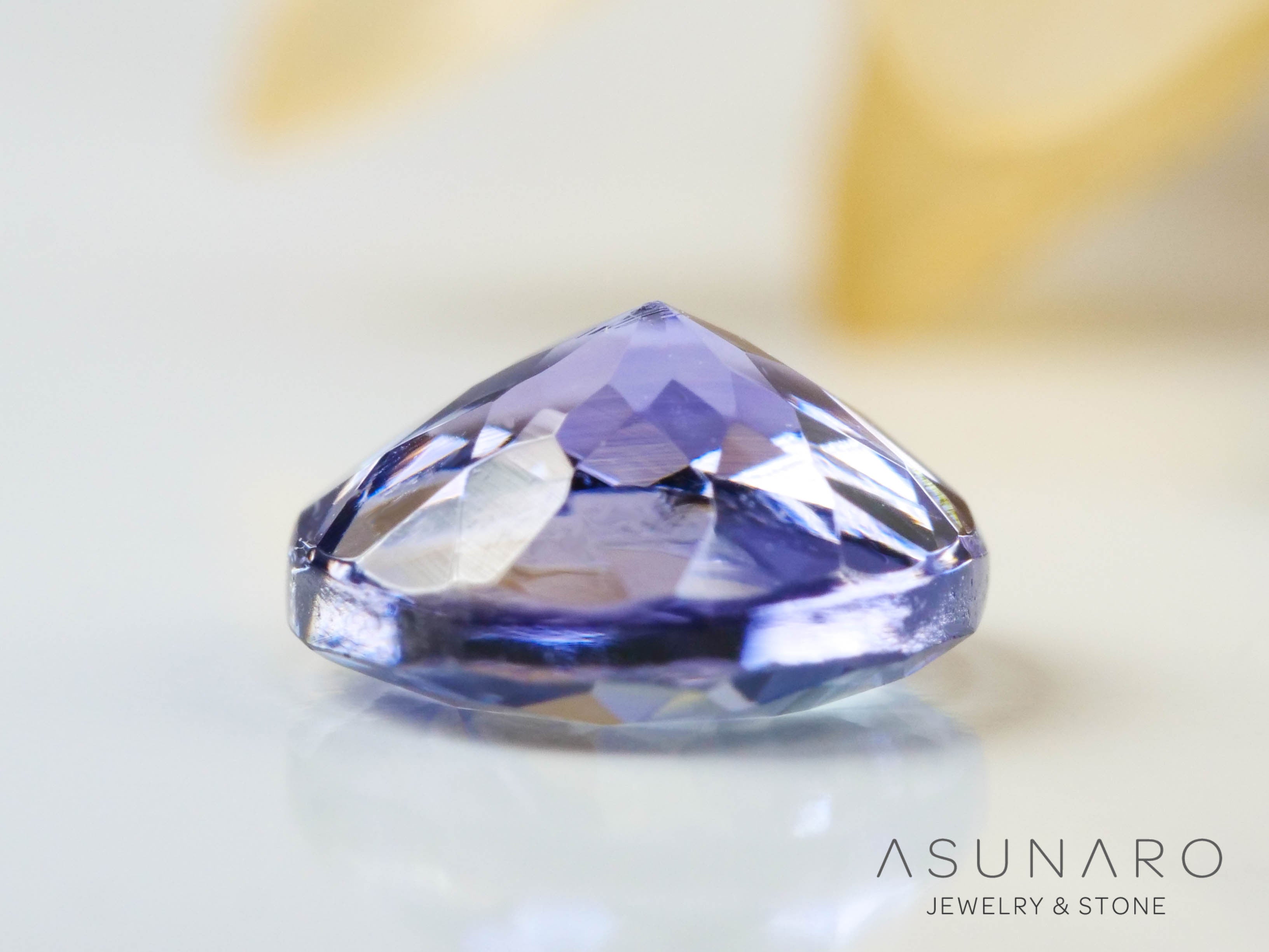 バイカラーゾイサイト（タンザナイト）  ラウンドカット　タンザニア産　0.87ct【241122-2620】