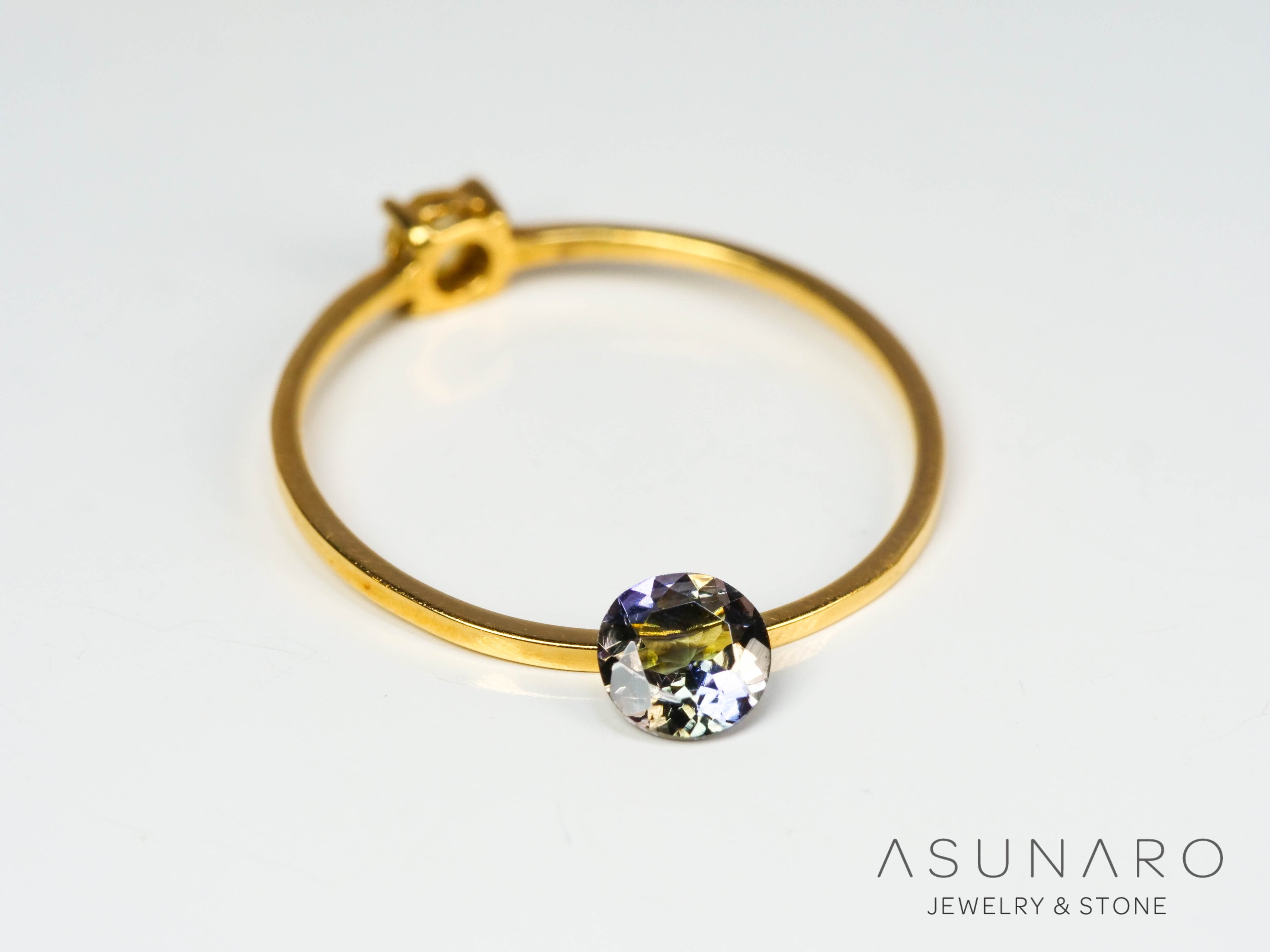 バイカラーゾイサイト（タンザナイト）  ラウンドカット　タンザニア産　0.32ct【241122-2622】