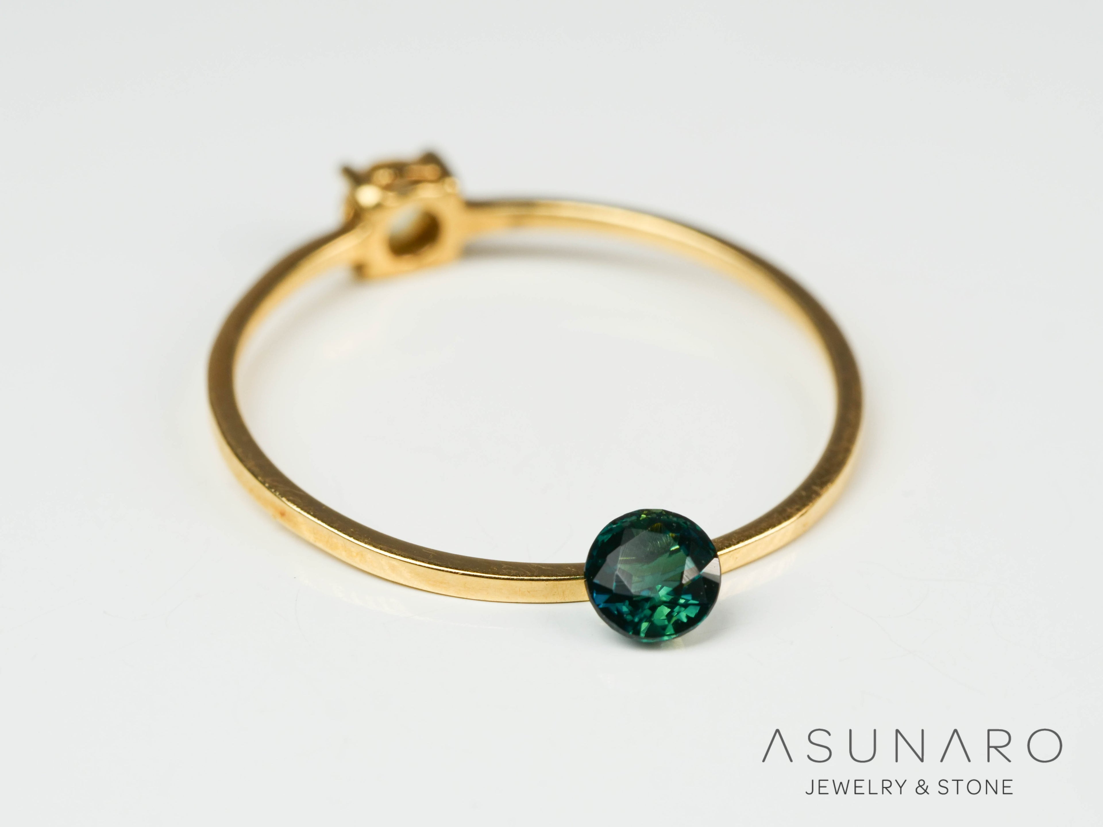 バイカラーラズライト　ラウンドカット　パキスタン産　0.20ct【241111-2700】