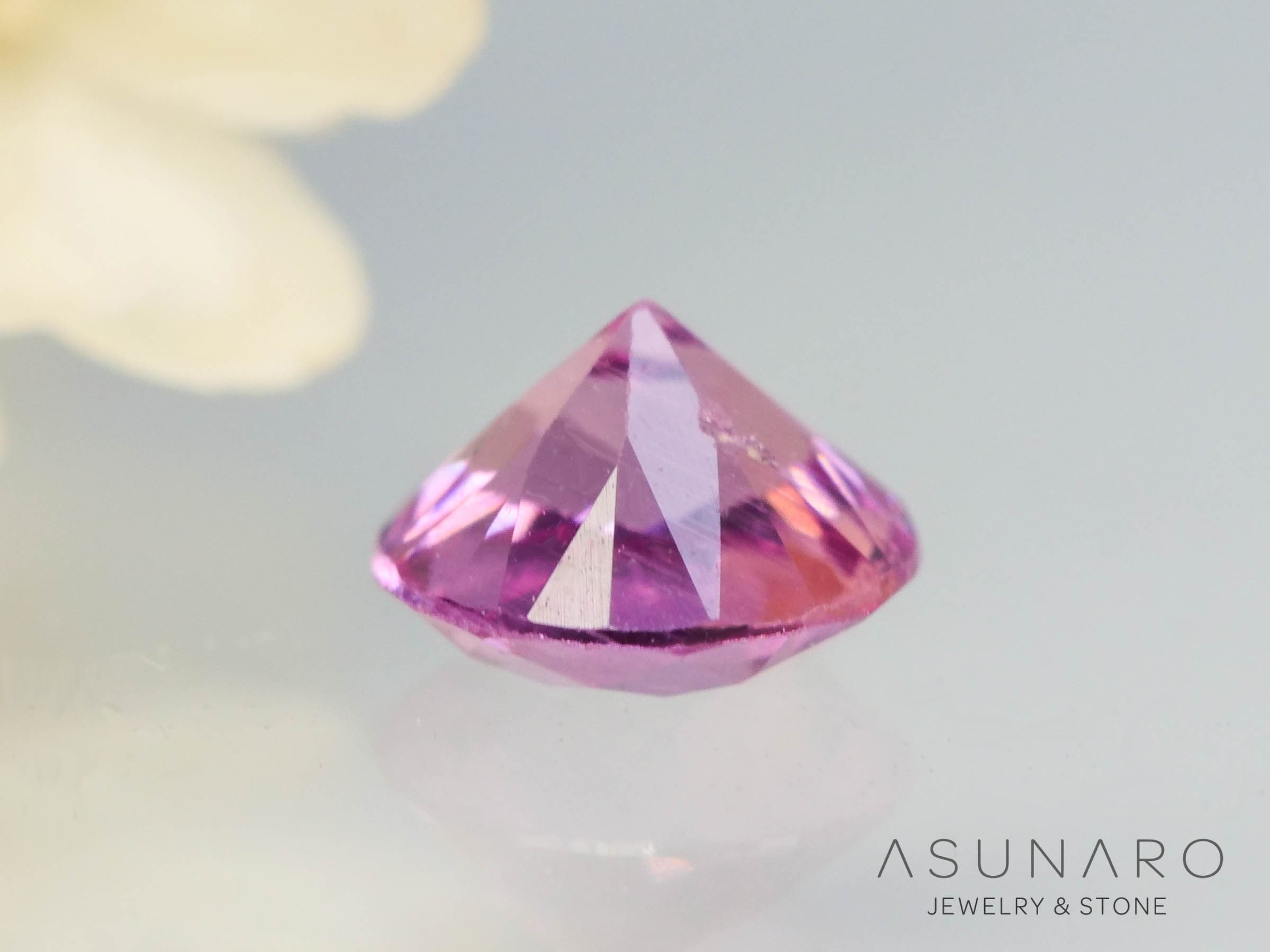 パパラチアサファイア ラウンドカット スリランカ産 ソ付き 0.19ct