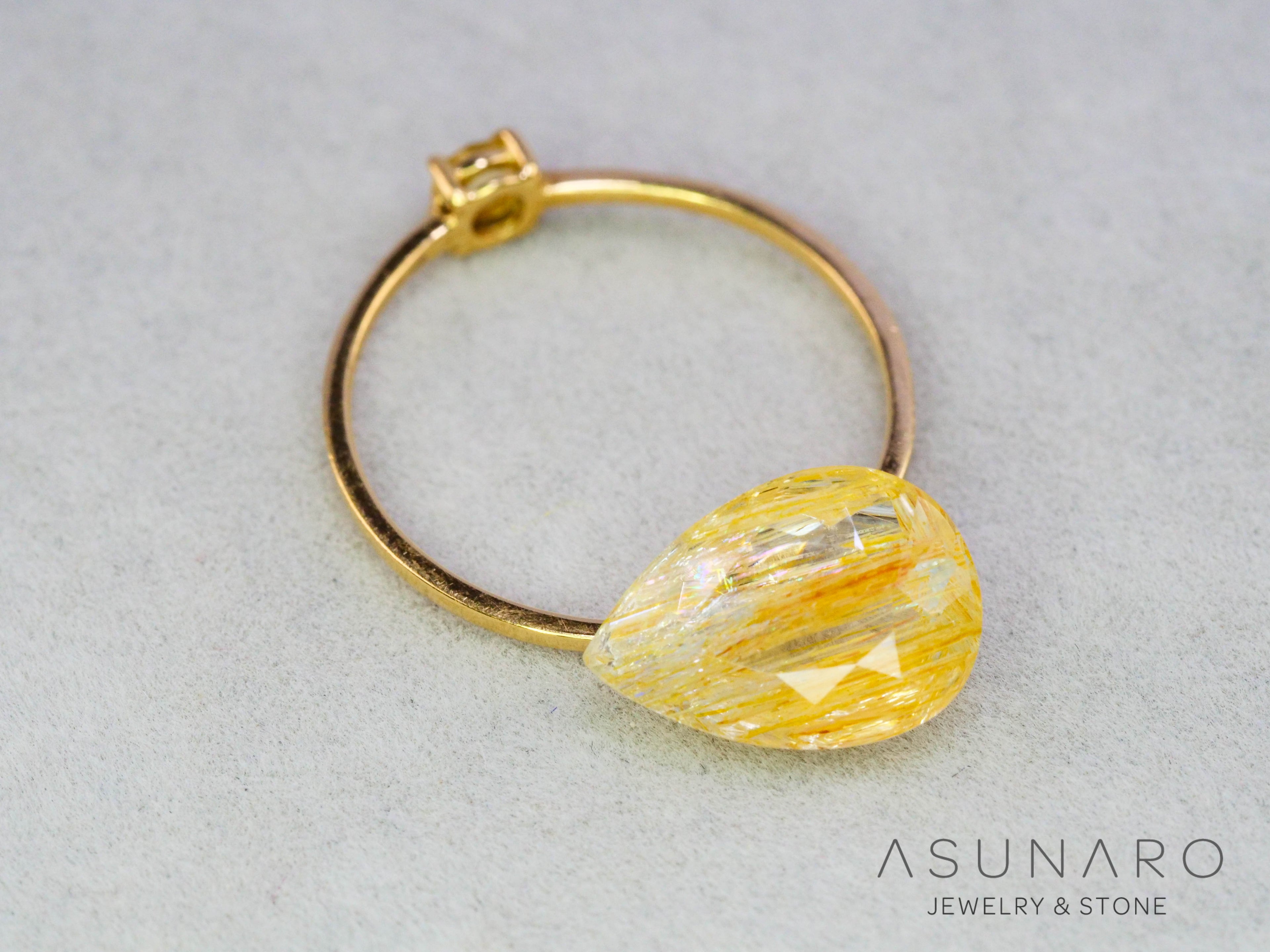 ルチルイントパーズ 　ペアシェイプ　ブラジル産　3.28ct　【251004-3101】
