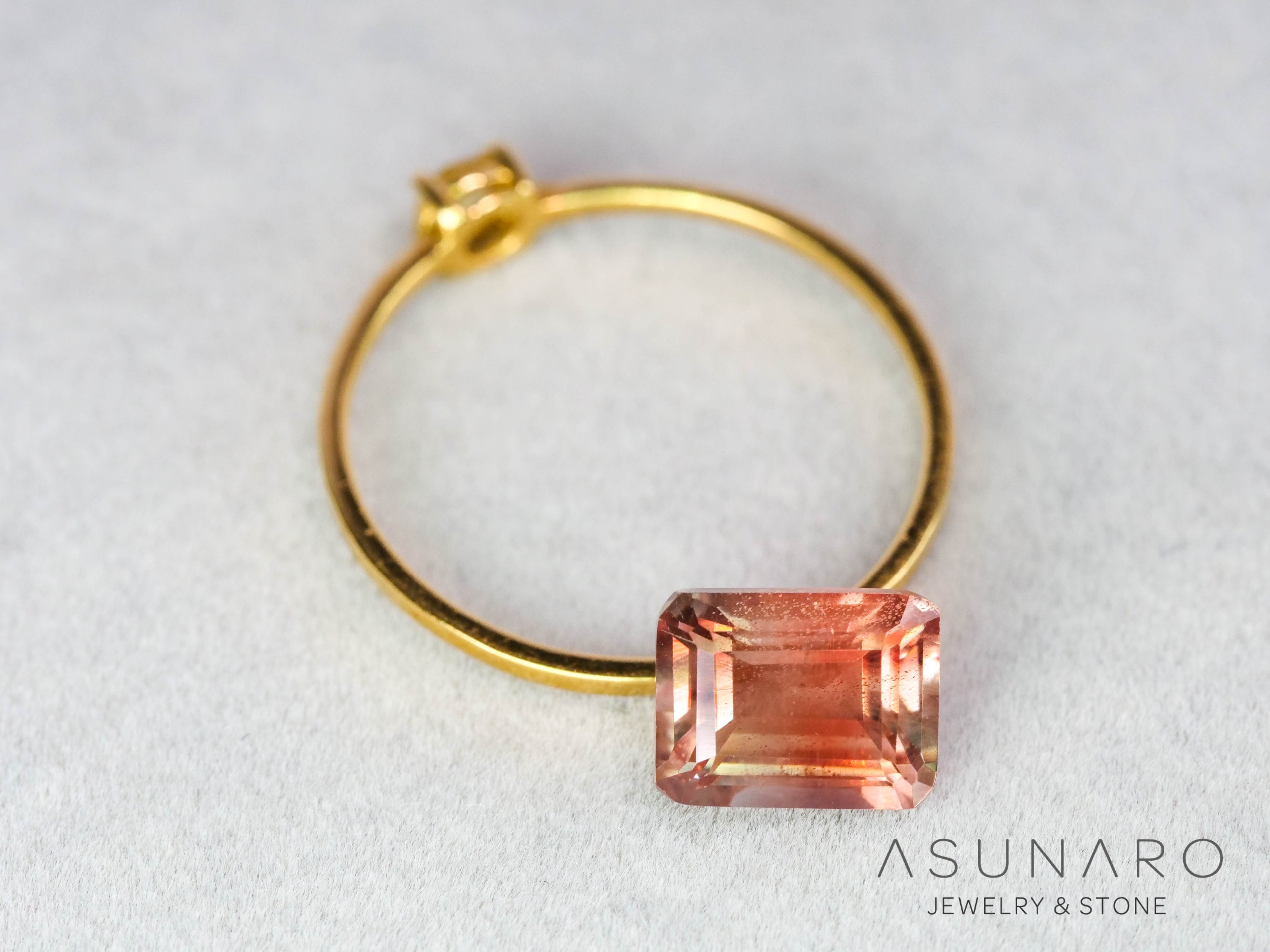 オレゴンサンストーン  エメラルドカット　 アメリカ産 　1.67ct【251017-3188】