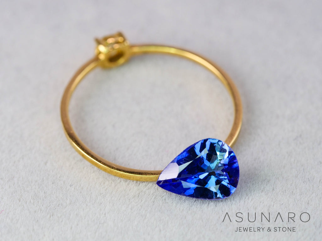 バイカラーゾイサイト（タンザナイト）ペアシェイプ　タンザニア産　0.98ct【251107-3119】