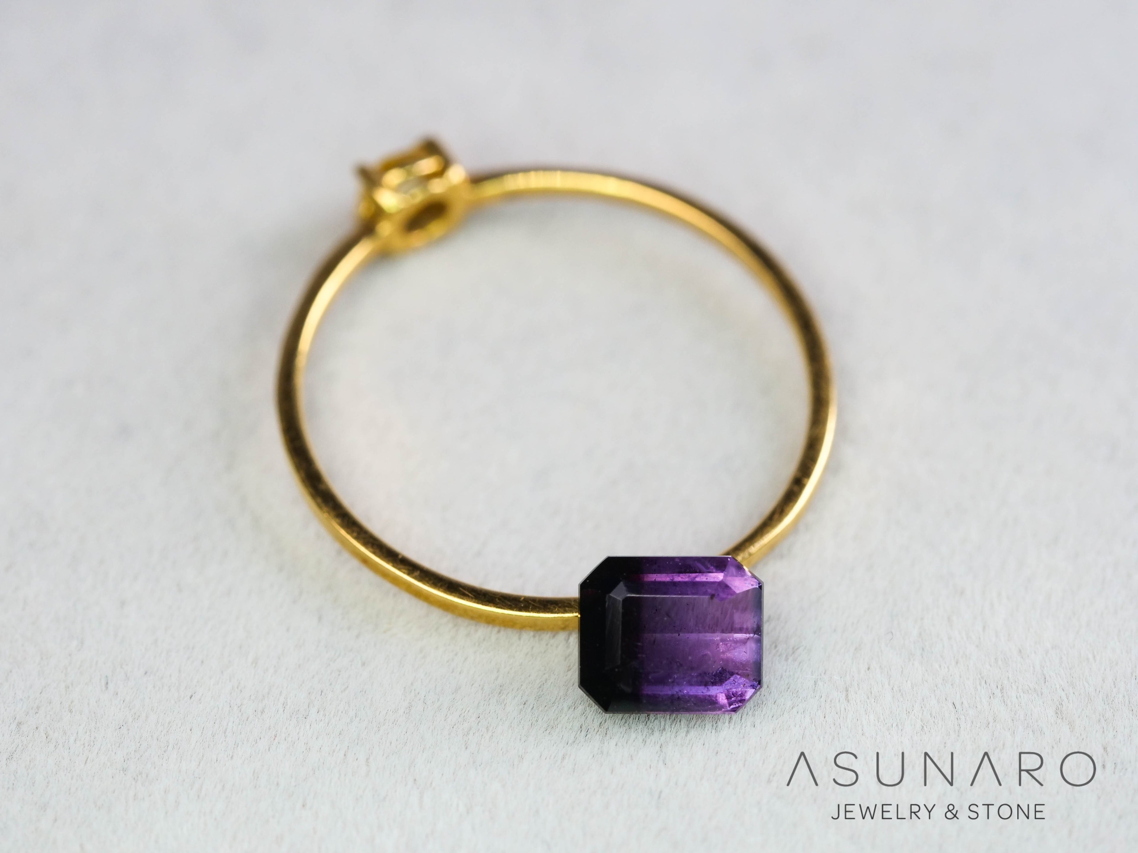 パープルバイカラートルマリン　エメラルドカット　アフガニスタン産　0.78ct【251121-3020】